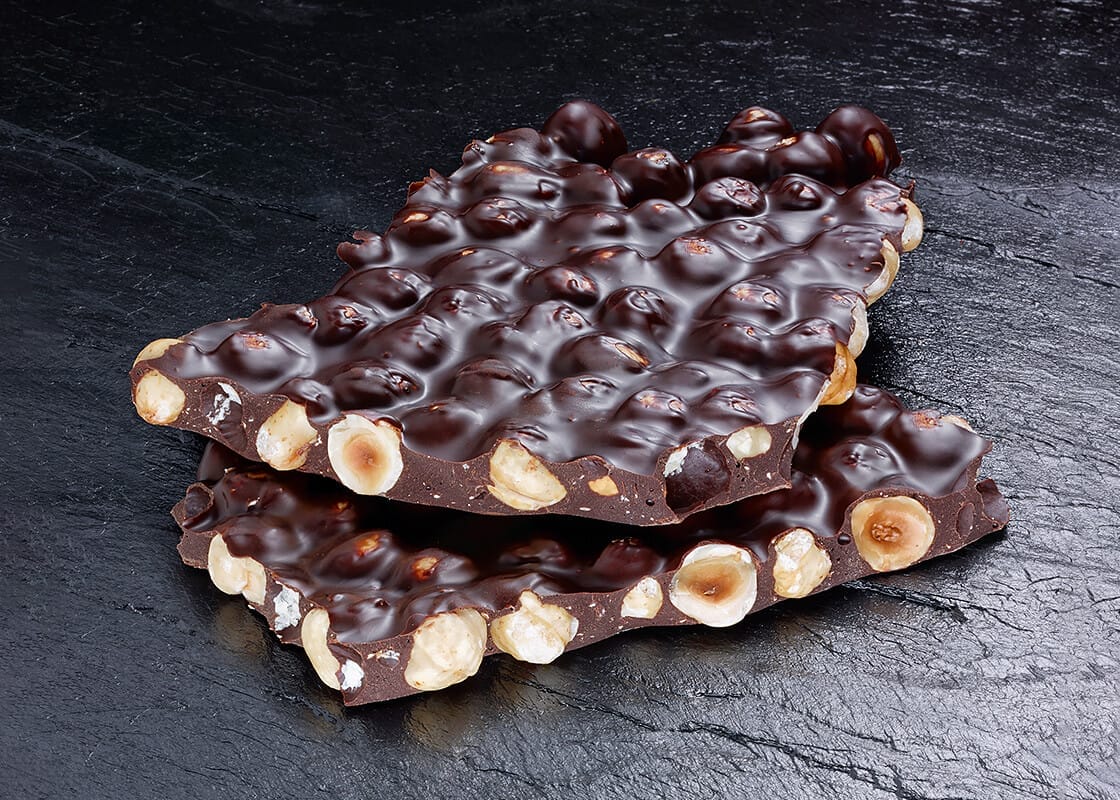 Geröstete Haselnüsse aus dem Piemont in Dunkler Schokolade 62%