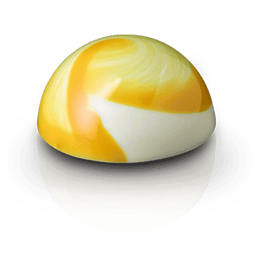 Vollmilch Schokolade als Basis für eine Ganache mit einem exotischen Mix aus Mango, Maracuja, Banane und Kokos.