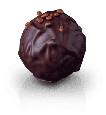 Piemonteser Grappa, angesetzt mit kräftigem Kakao prägt diese Dunkle Ganache.
